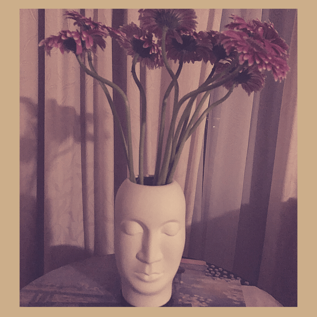 Contemplative face vase