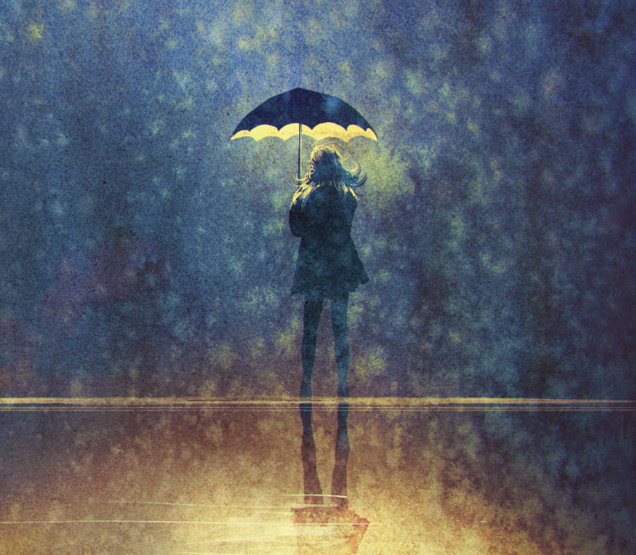 woman in the rain with umbrella