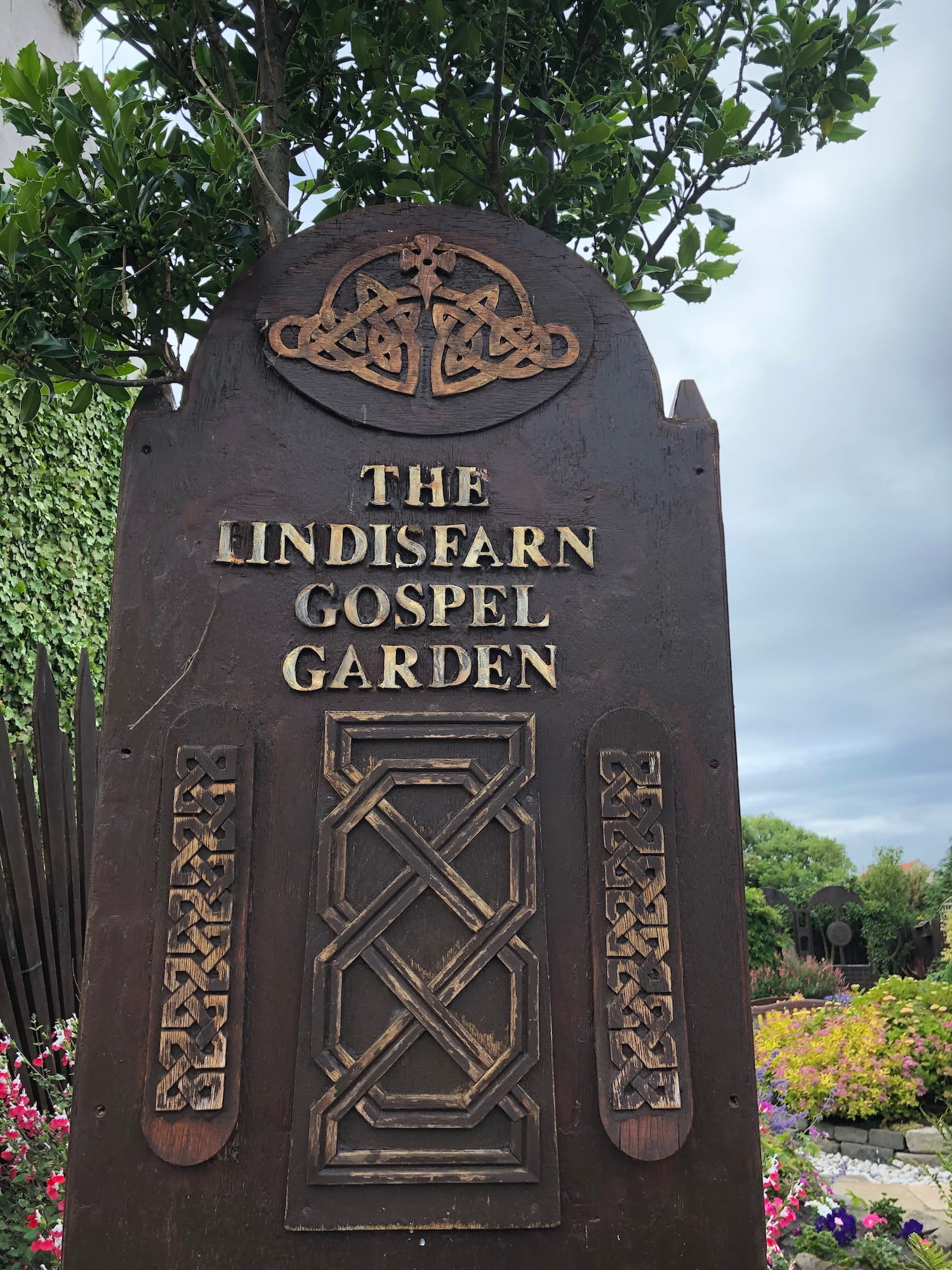 sign lindisfarn gospel garden